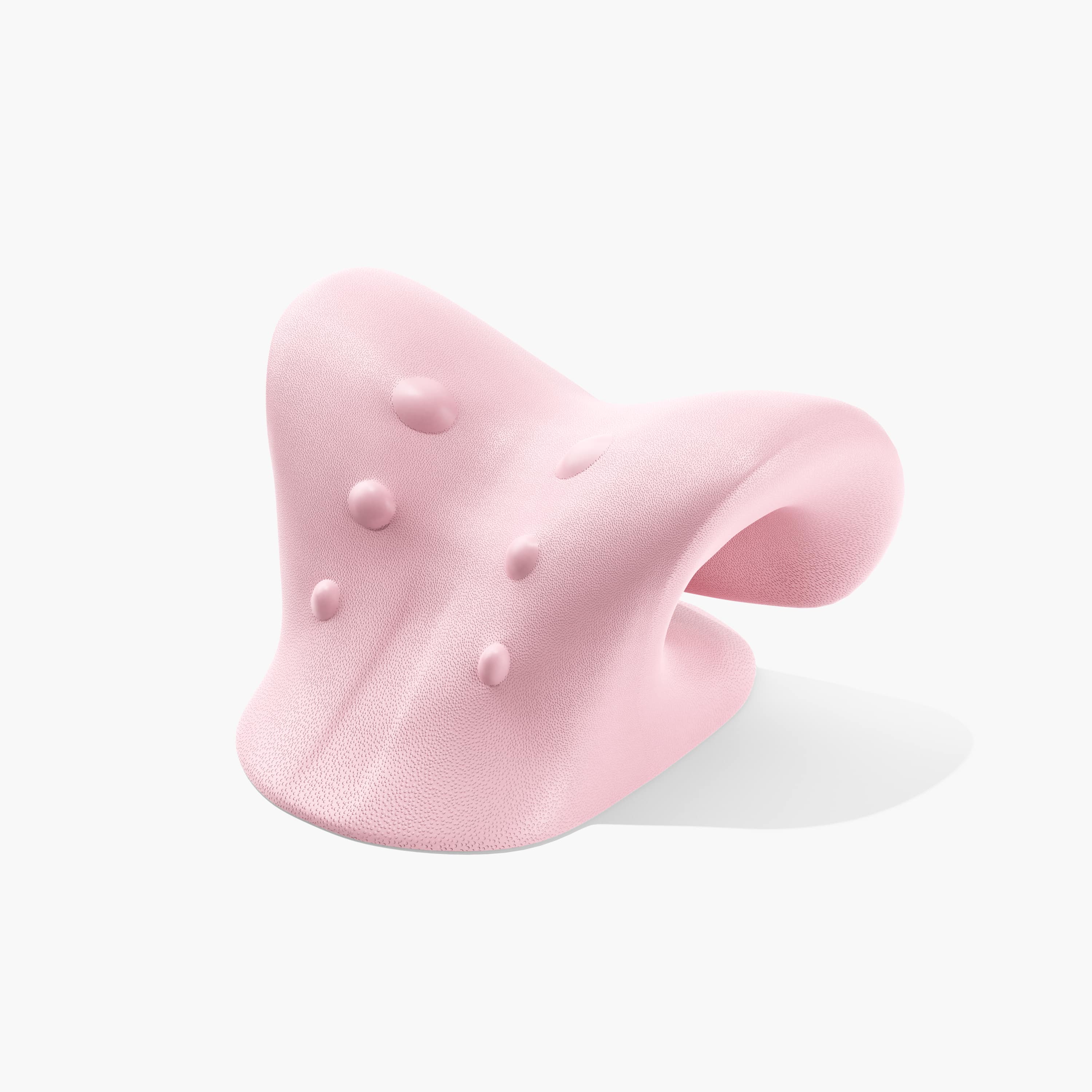 Juno by Nomisk. A pink cervical traction pillow that instantly relieves neck pain. Relieve tension, improve sleep, posture and blood flow by using Juno to stretch out your neck.